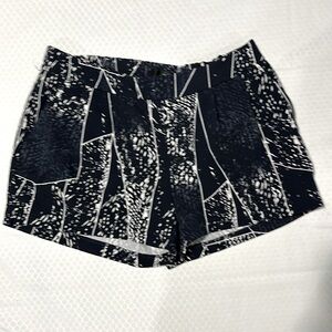 Black shorts with pattern of white and navy dressy shorts. 3 inch inseam